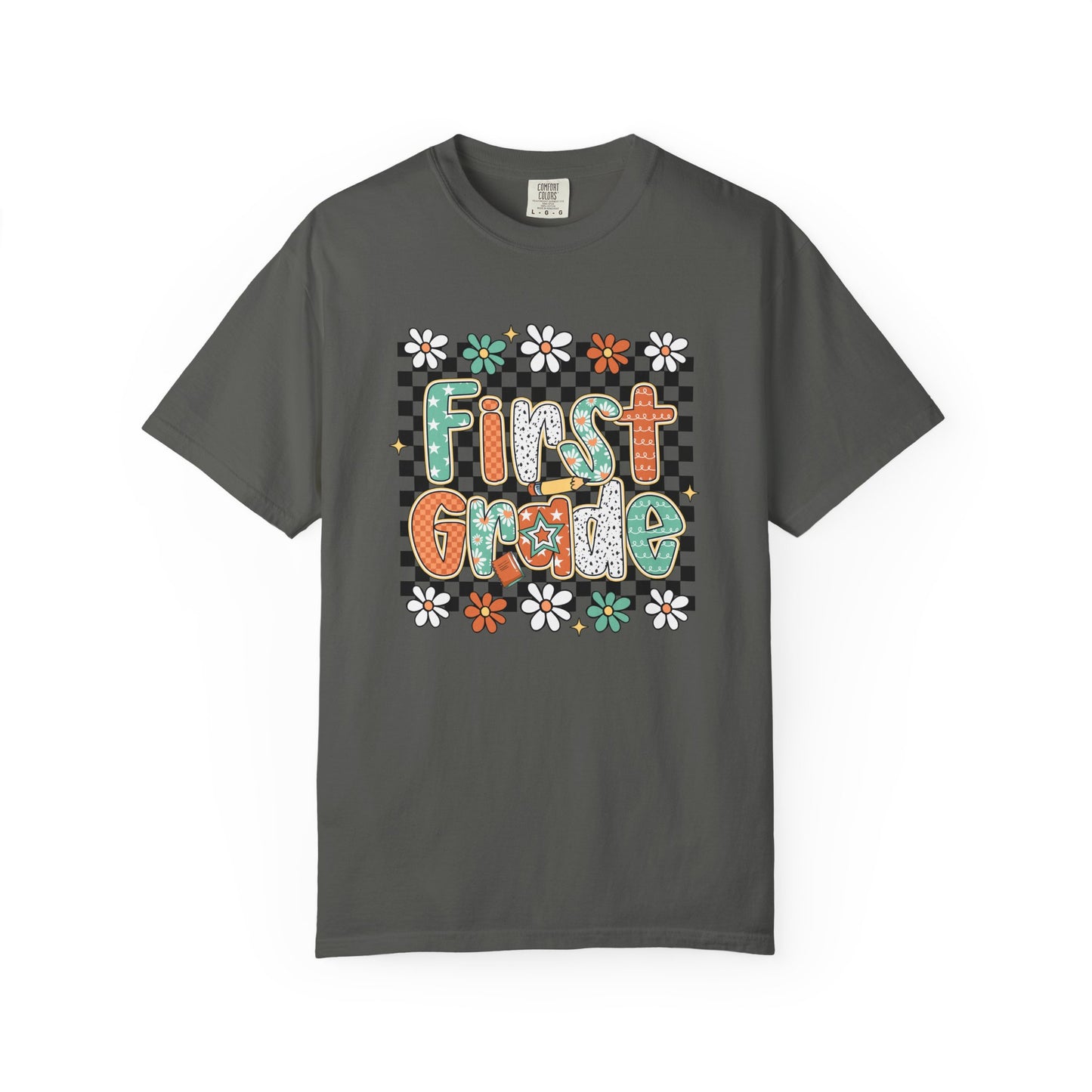 Gray t-shirt with 'First Grade' text and floral designs on a white background